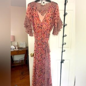 Spring v-neck wrap dress with quarter-length sleeves. By Lovestitch, size: M.